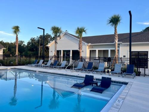 Apartments for rent in Ocala A serene community pool area with lounge chairs and palm trees during twilight at the Apartments in Ocala. Aurora St. Leon Apartments in Ocala 2150 NW 21st Avenue | Ocala, FL 34475 (352) 233-4133